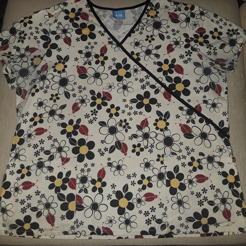 SOLD.        (3 for $10)Flower Scrub Top